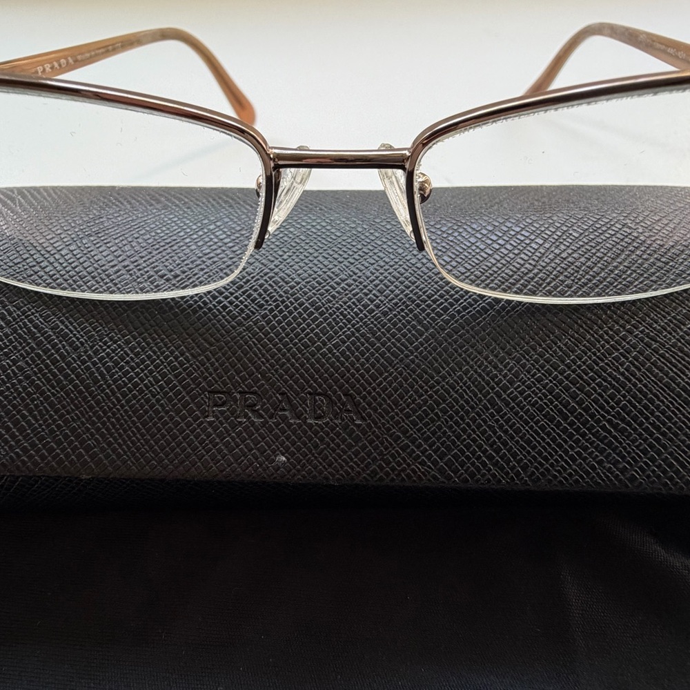 Prada Rimless Rectangle Glasses With Gold-Tone Temples And Black Case View 2